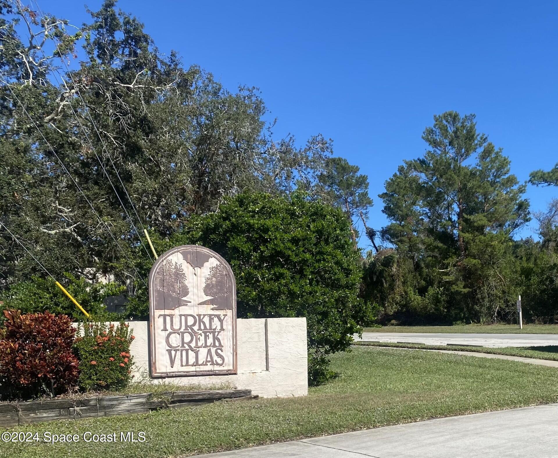 1 turkey creek entrance with sign