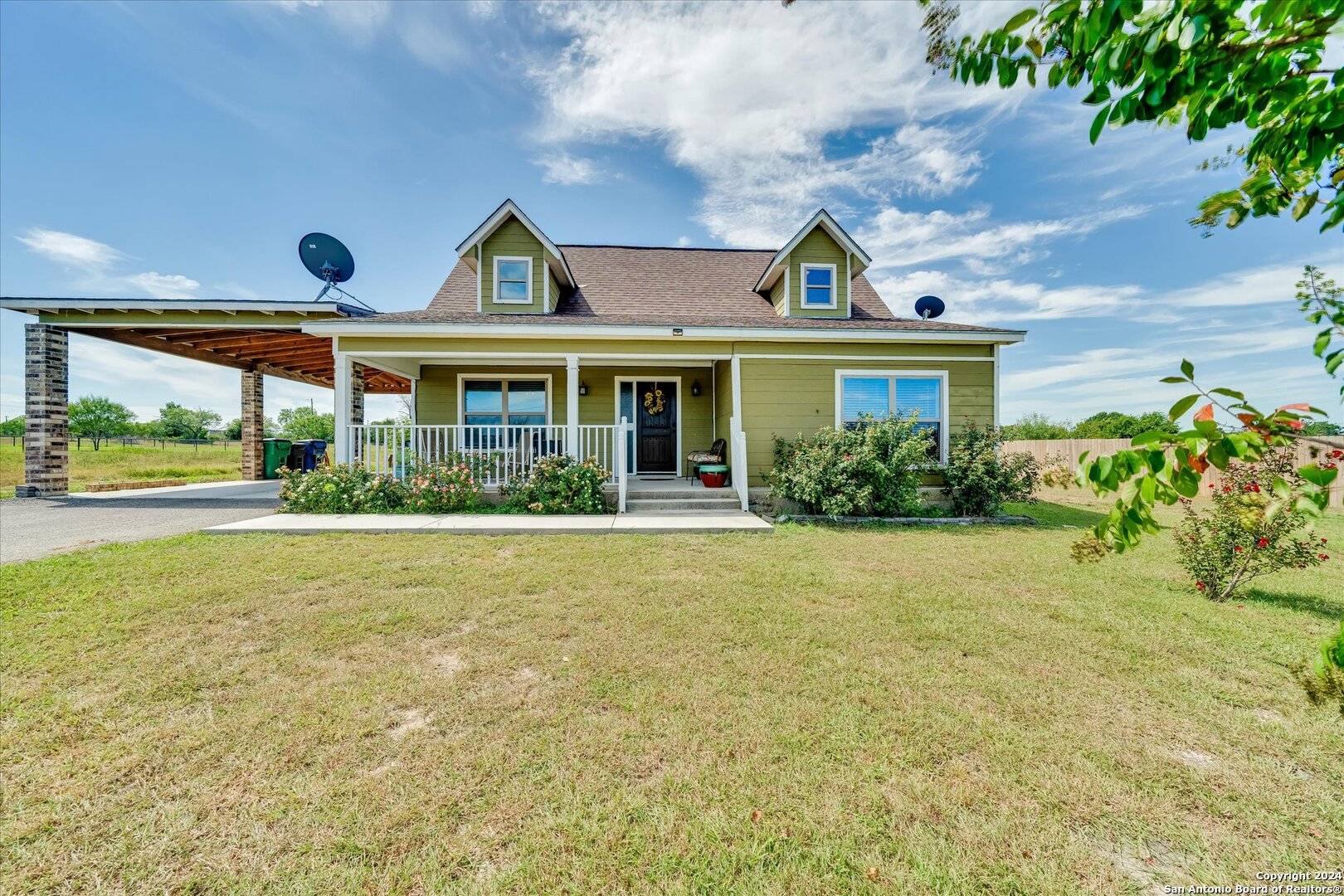 a front view of house with yard