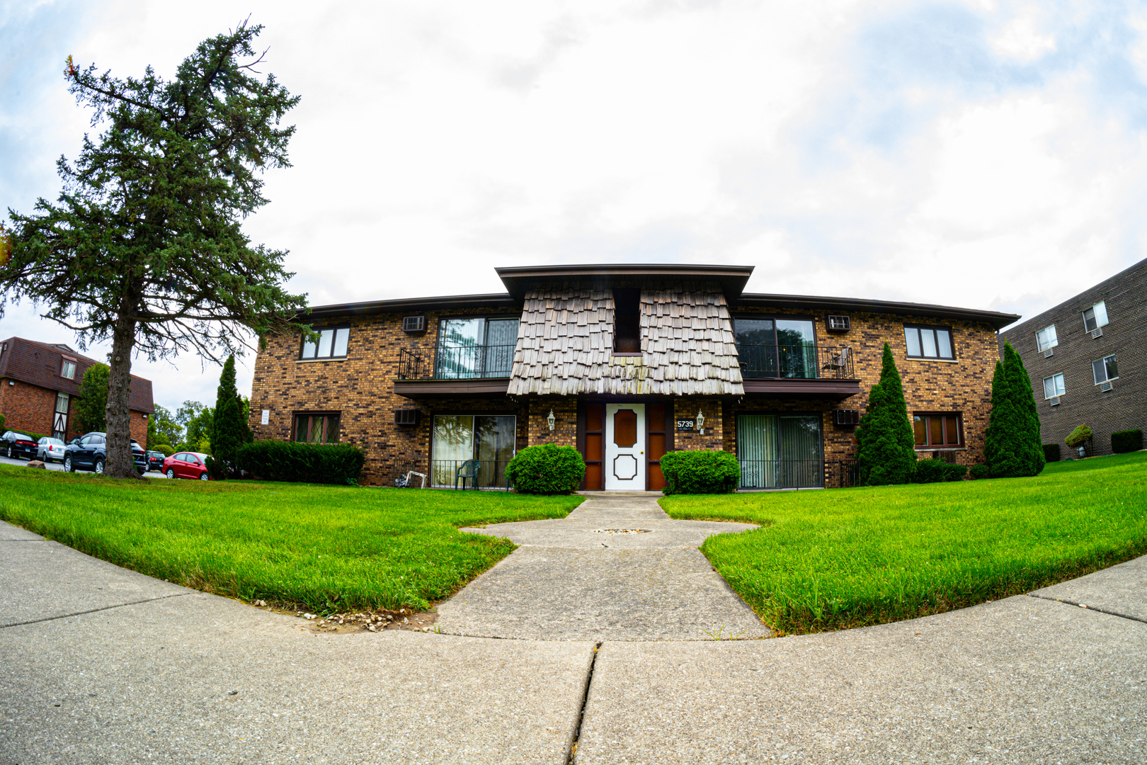 a front view of house with yard