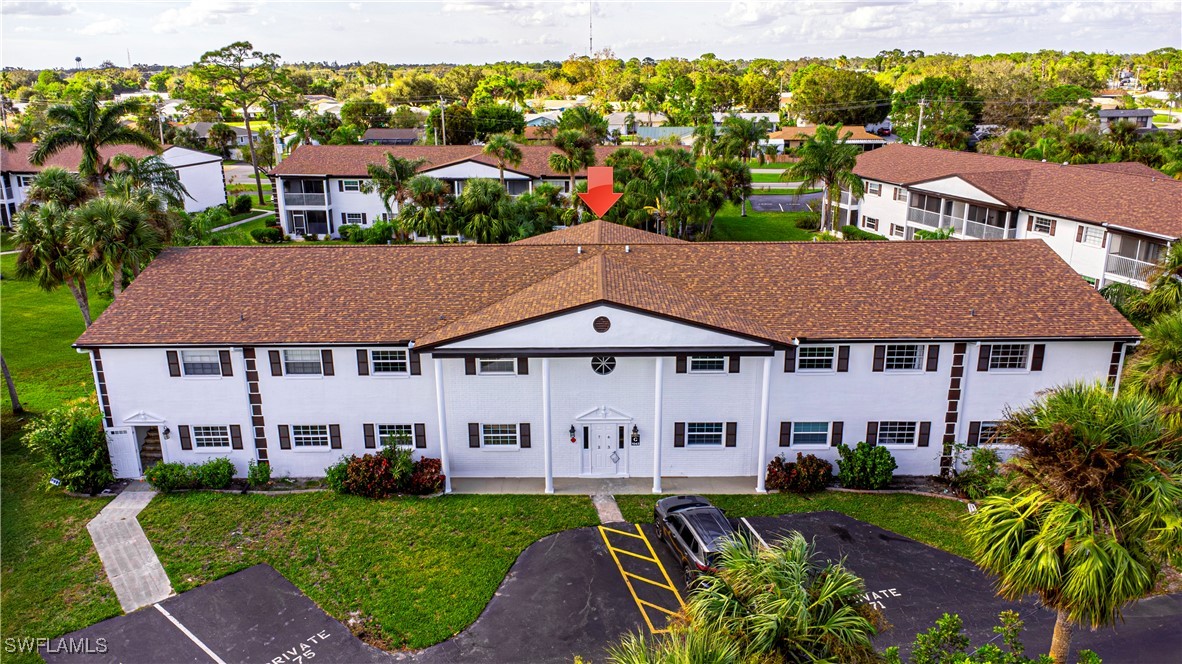 an aerial view of a house with garden