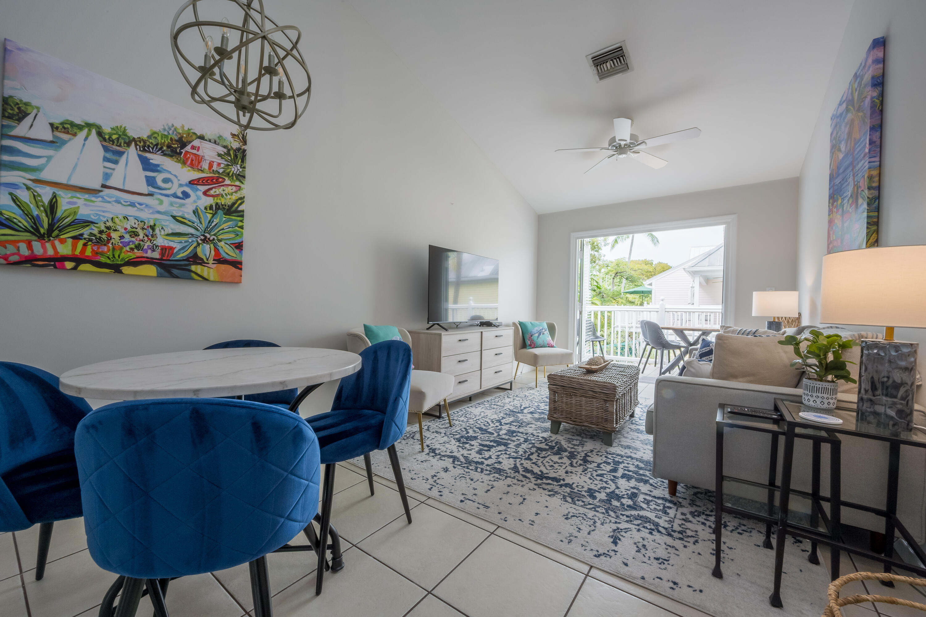 a living room with furniture and a table