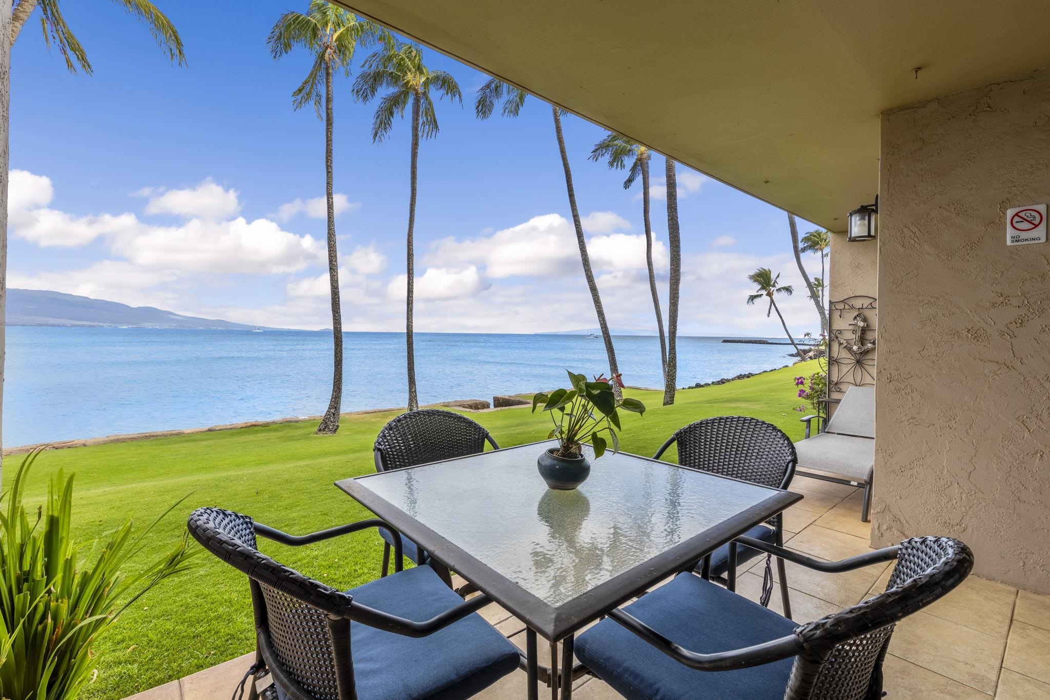 a view of an outdoor sitting area with furniture