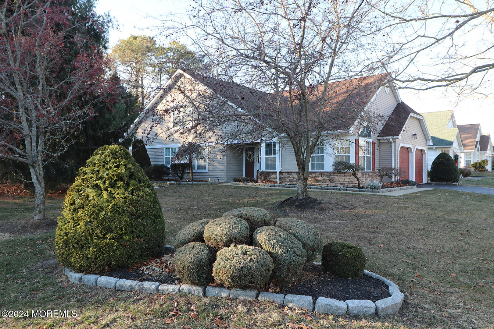 a view of a yard with large tree