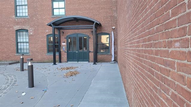 a view of a brick house with front door