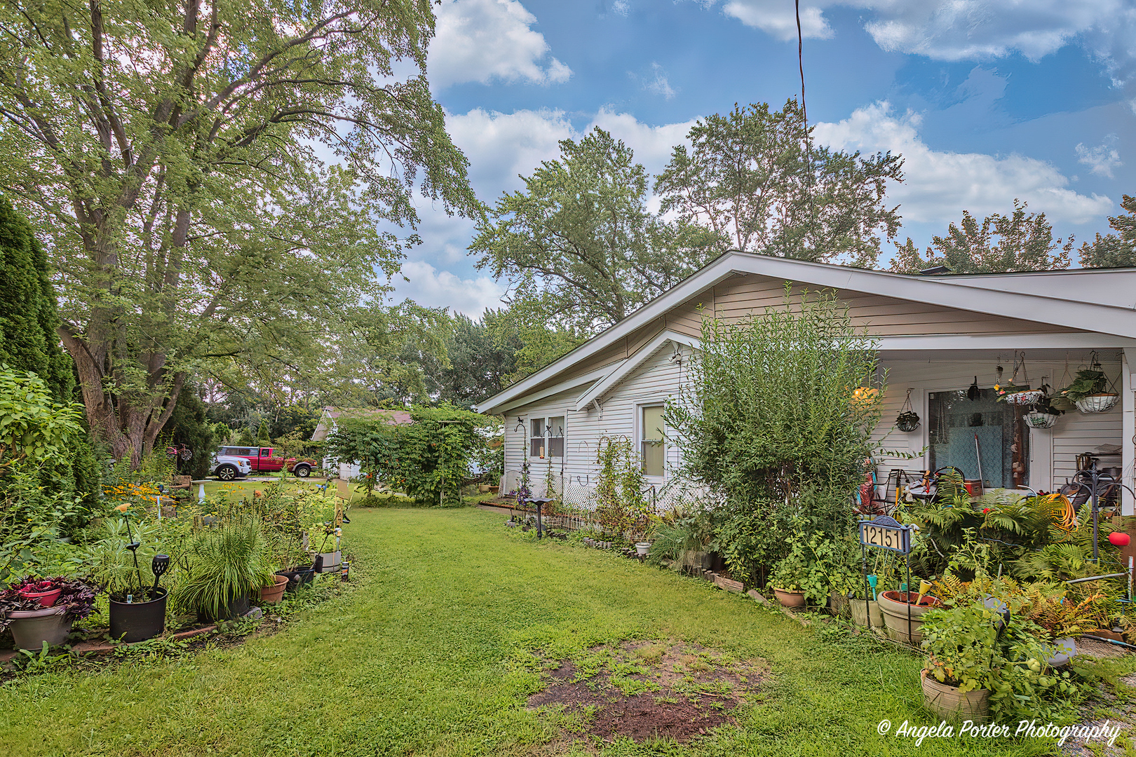 a view of a house with a yard