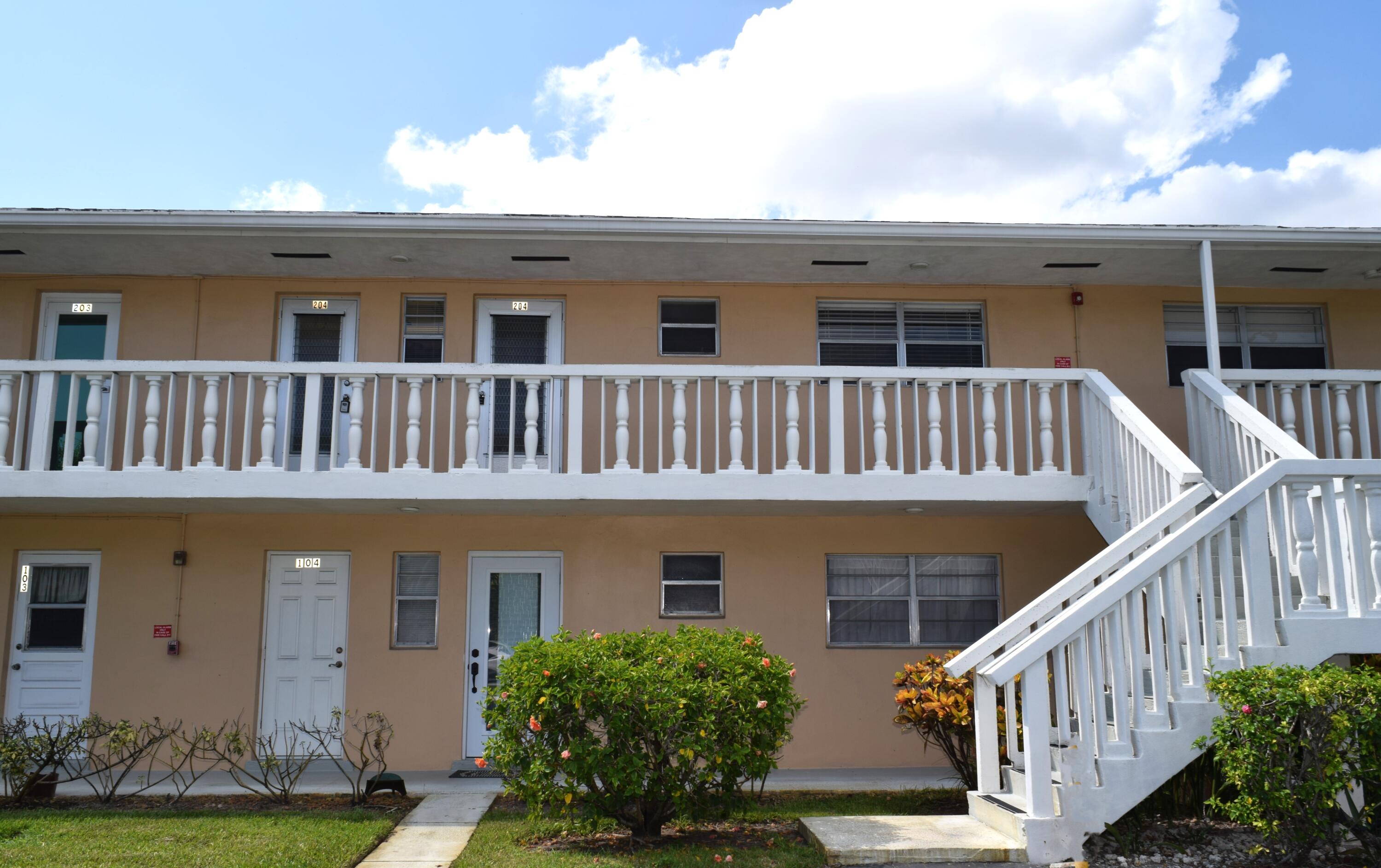 a front view of a house with balcony