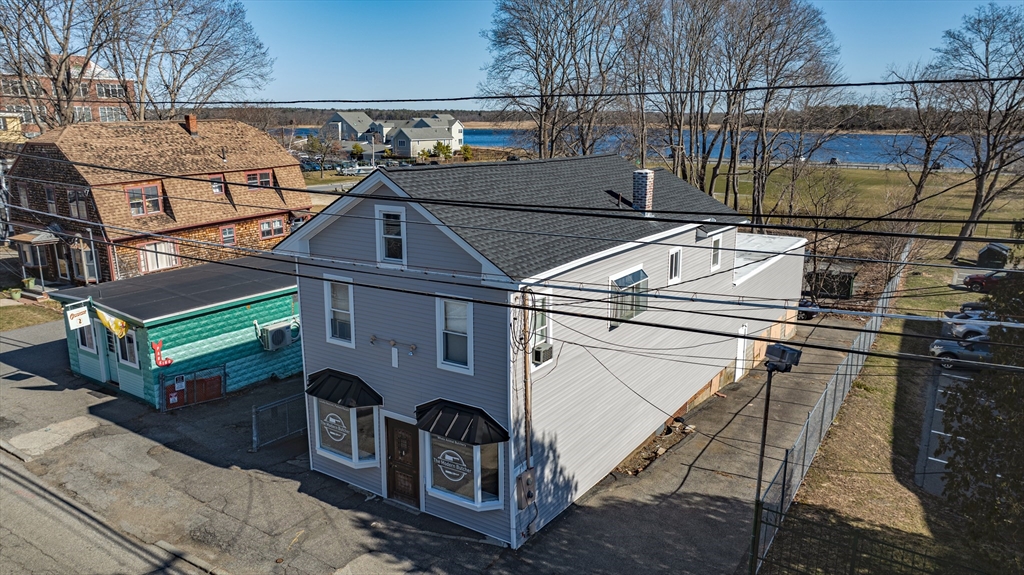 a front view of a house with parking area