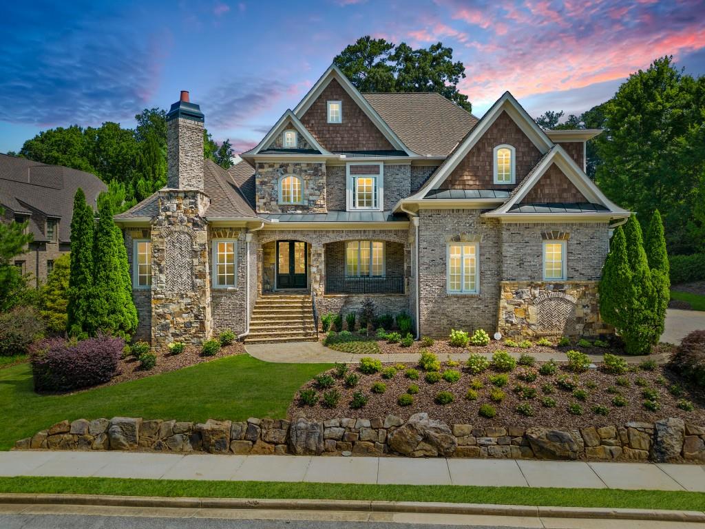 front view of a house with a yard