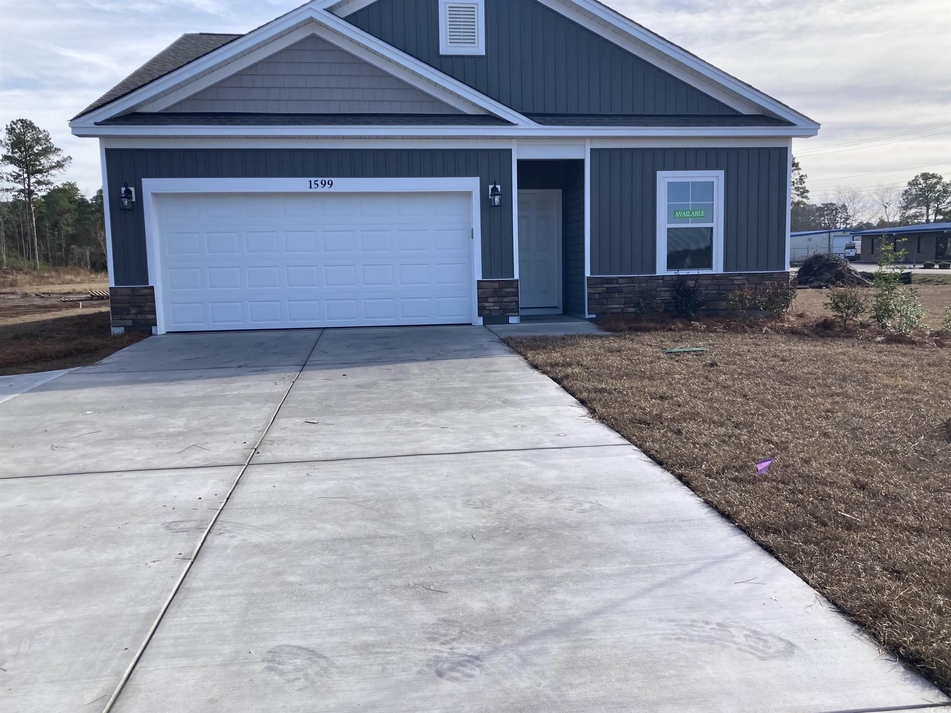 View of front of house with a garage