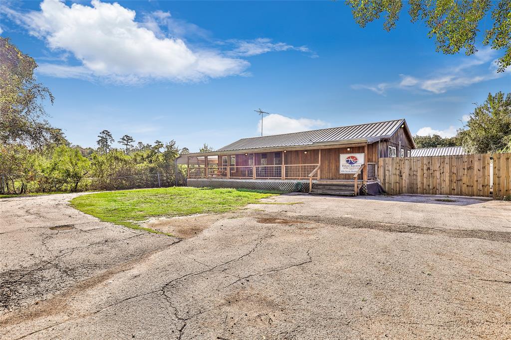 a view of house with backyard and entertaining space