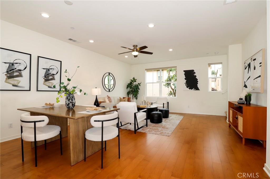 a view of a livingroom with furniture and a window