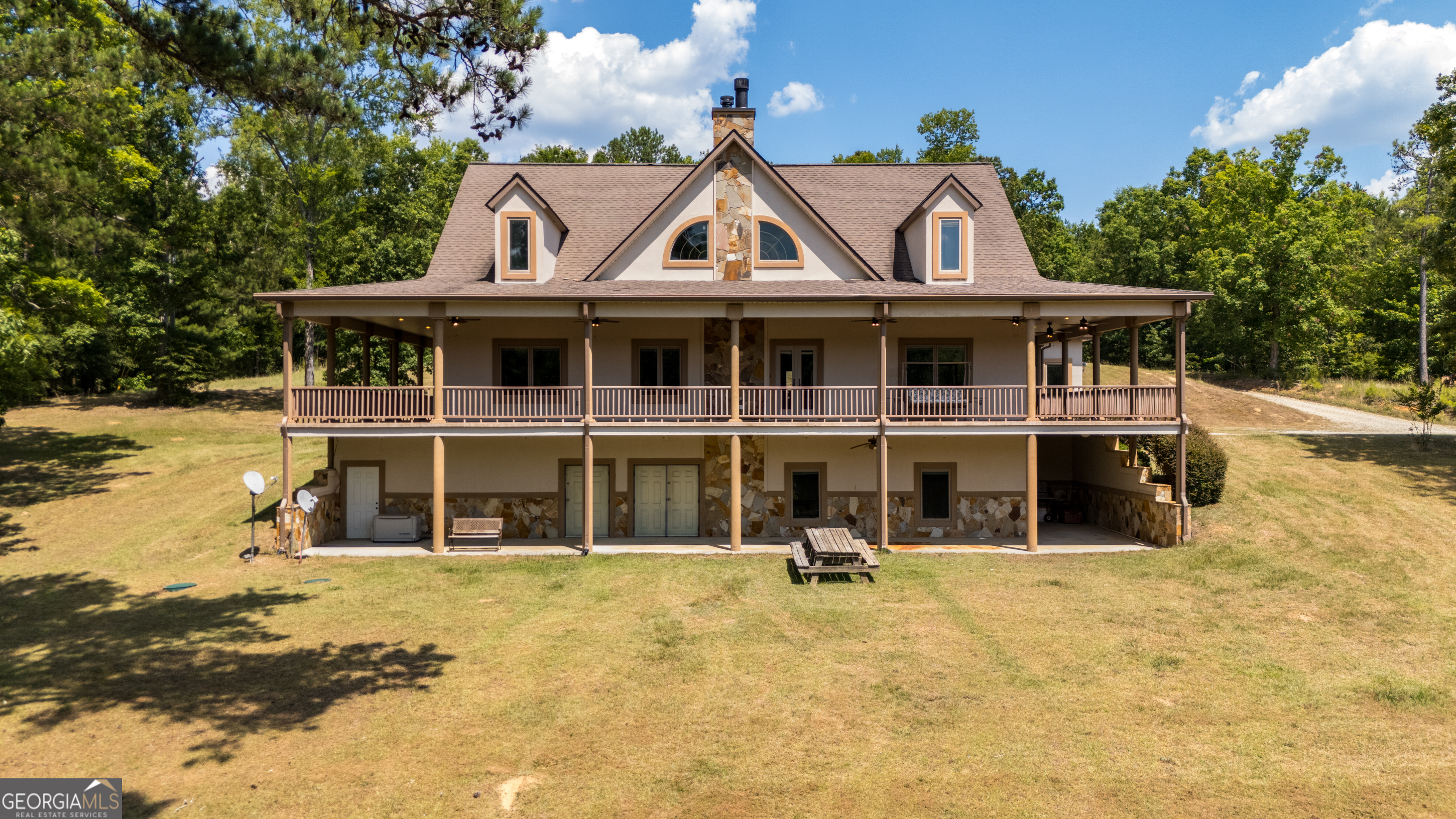 a front view of a house with yard