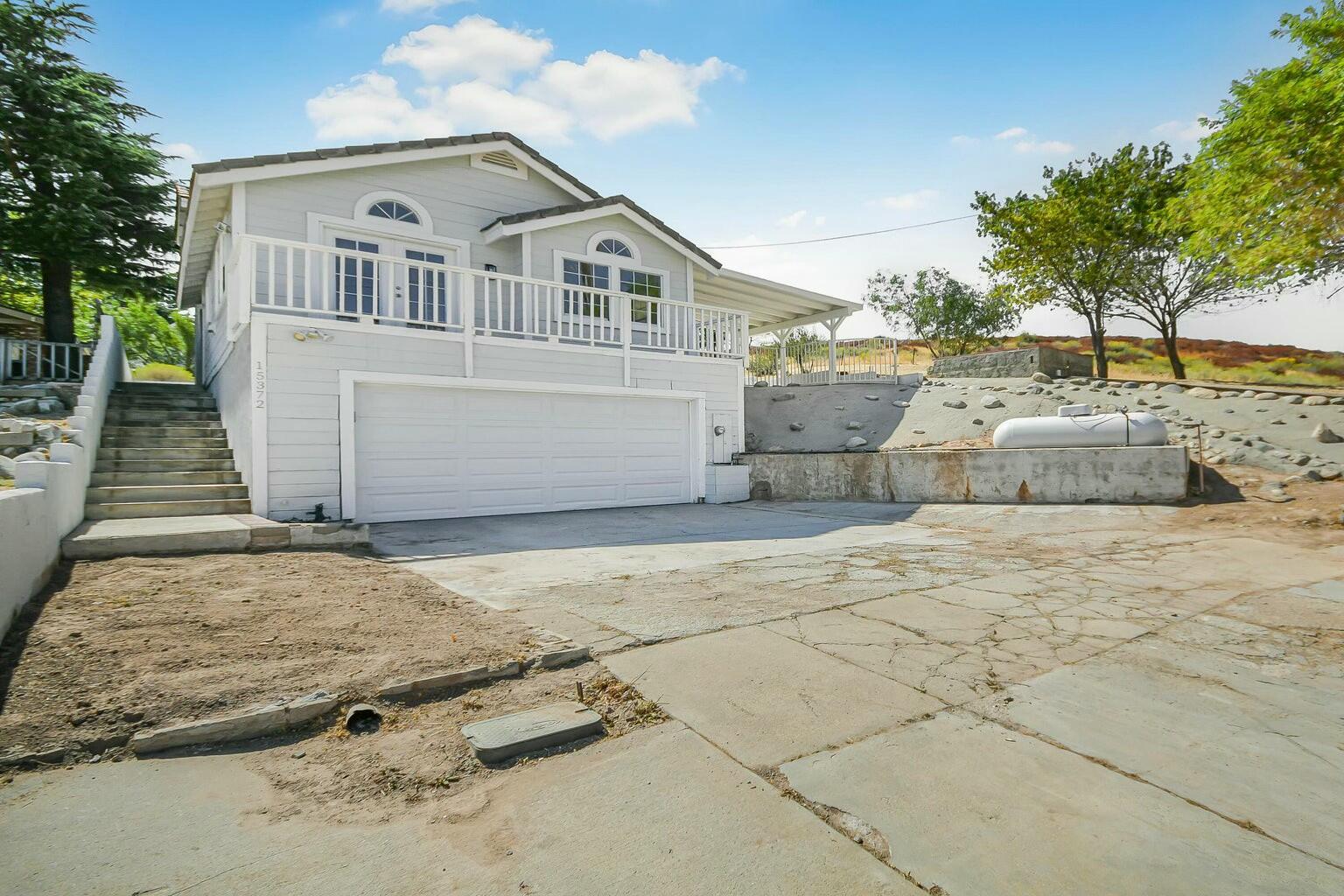 a front view of a house with entertaining space