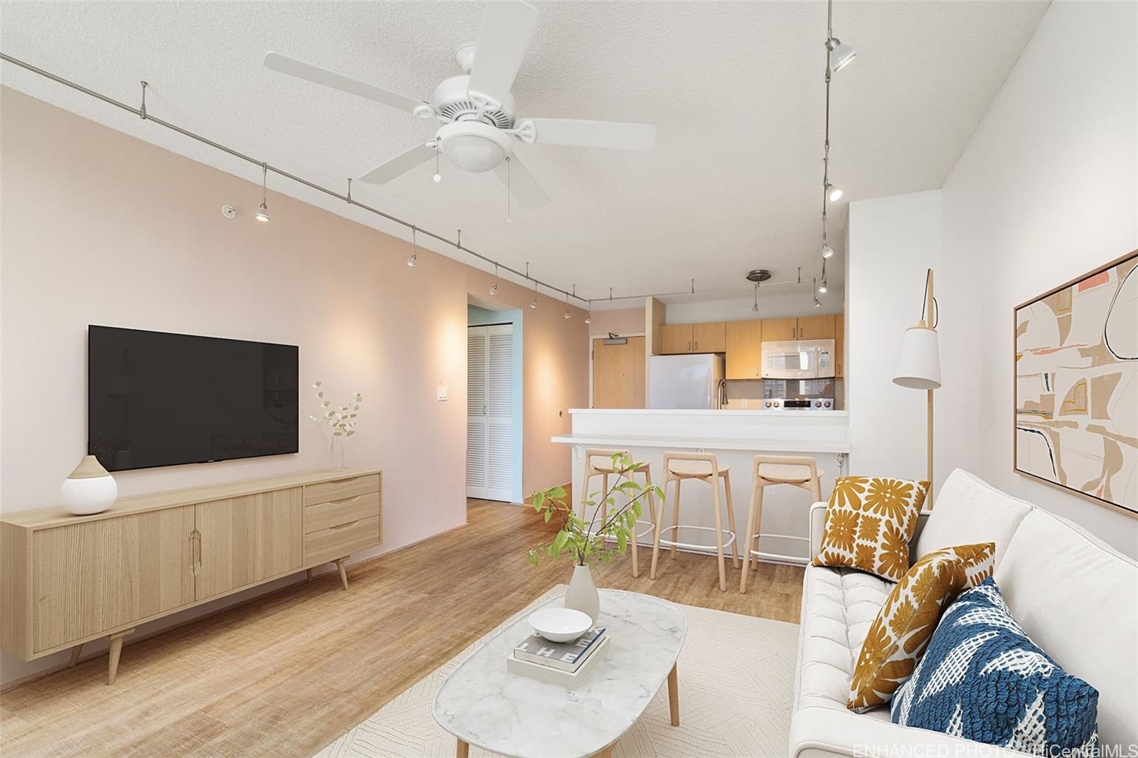 a living room with furniture and a flat screen tv