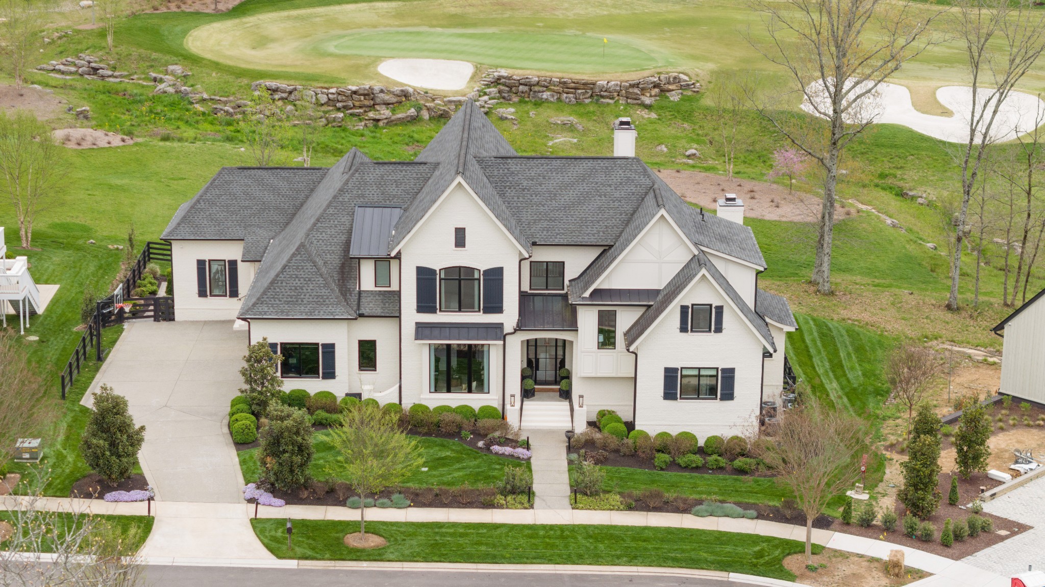 a aerial view of a house with a yard