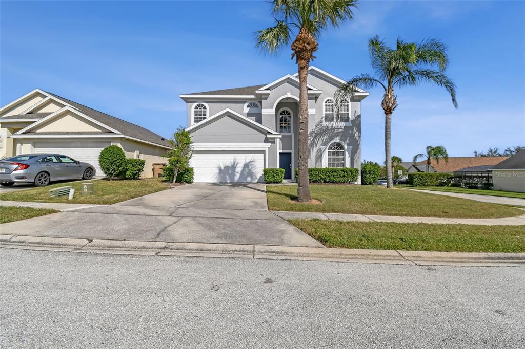 front view of a house with a small yard