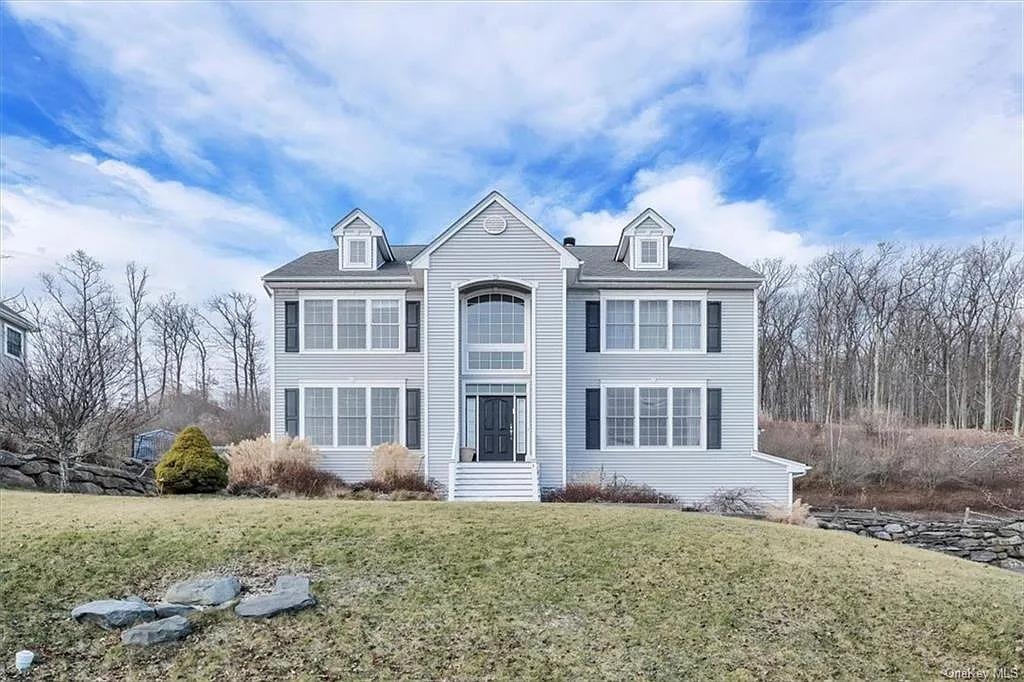 View of front of home with a front lawn