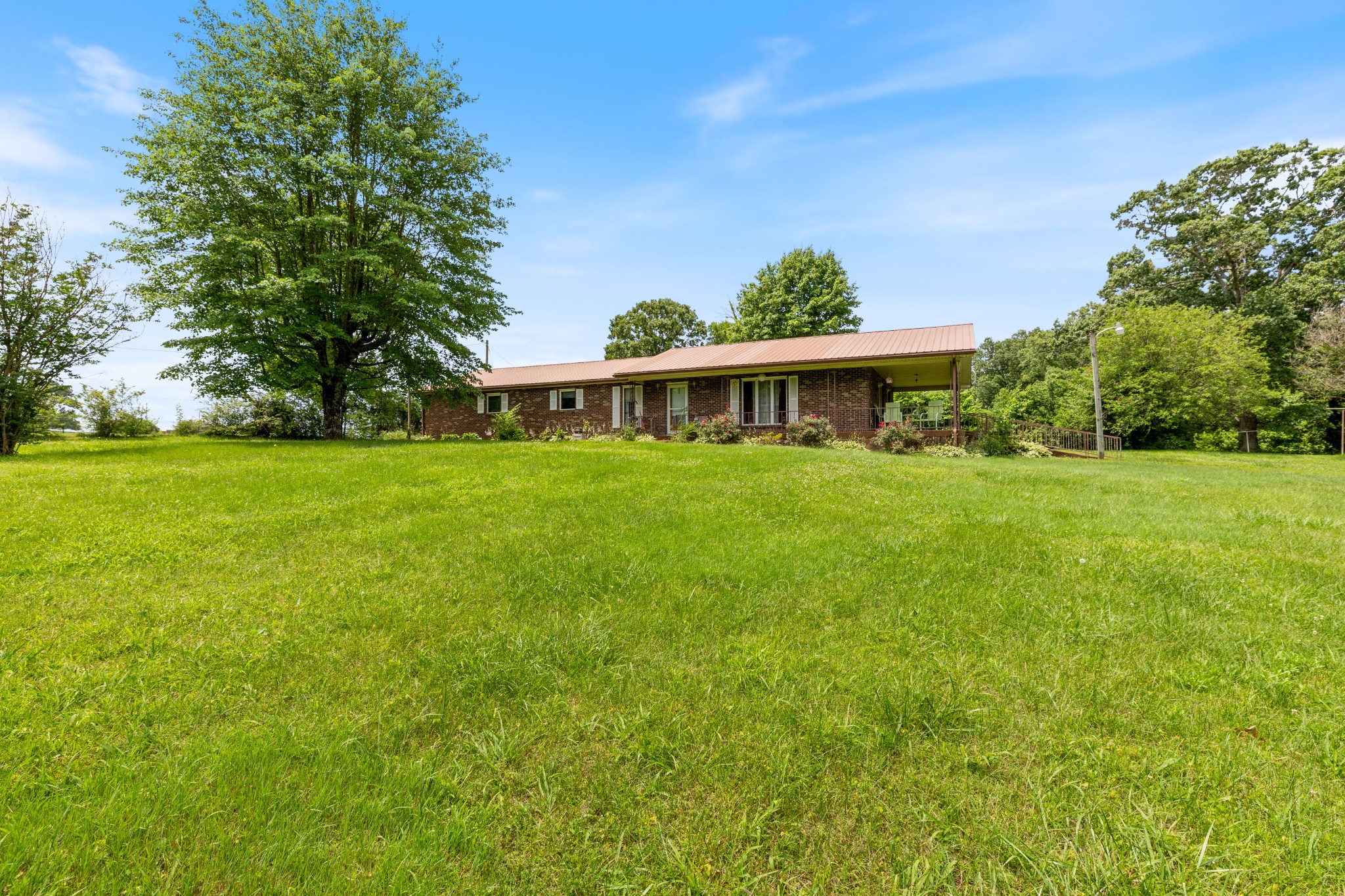 a view of a house with a big yard