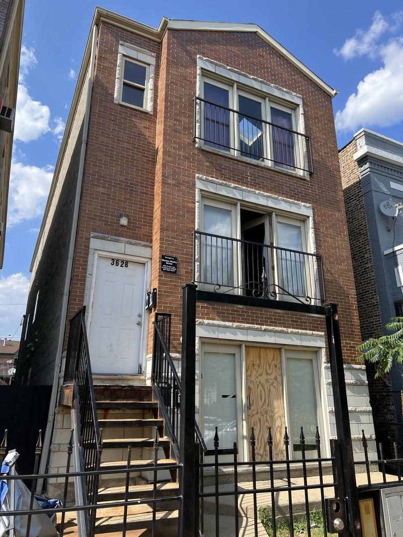 a front view of a house with a balcony