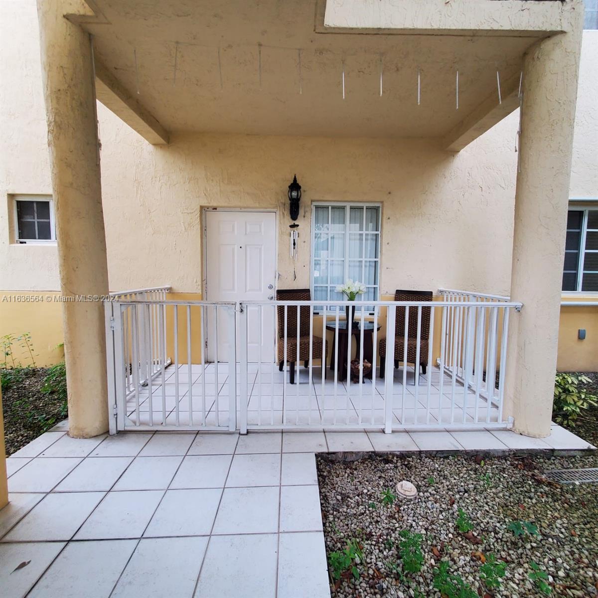 a view of a porch with furniture