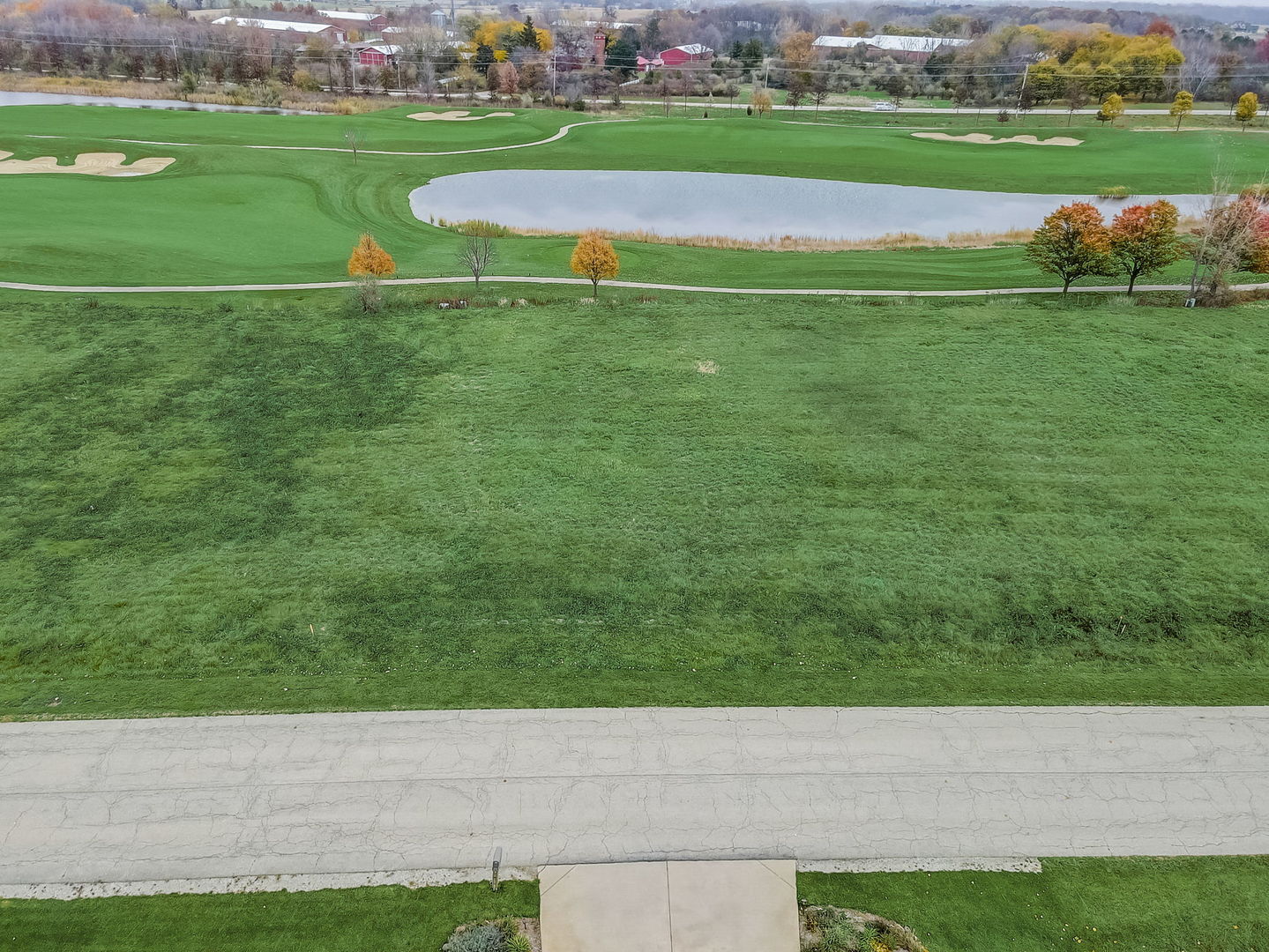 a view of a golf course with a park