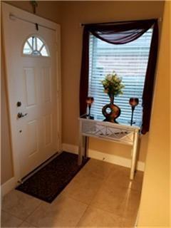 a view of a entryway door of the house