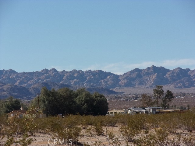 a view of a lake with mountains in the background