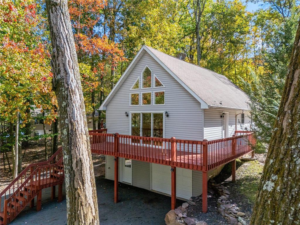 a view of a house with a roof deck