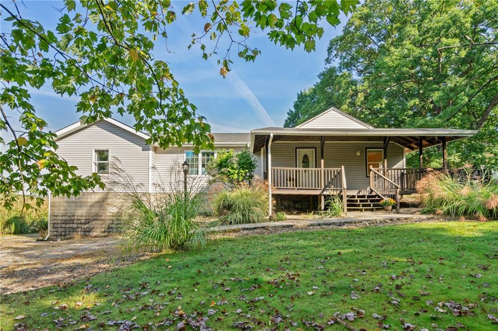 Welcome Home! Nearly 2000 Sq Ft Country Ranch-Style Home