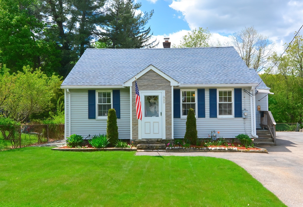 front view of a house and a yard