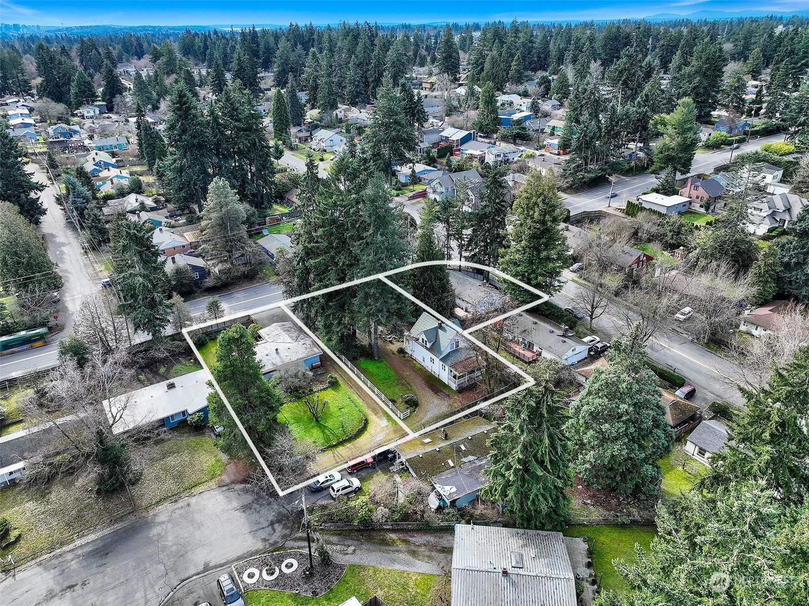 an aerial view of house with yard