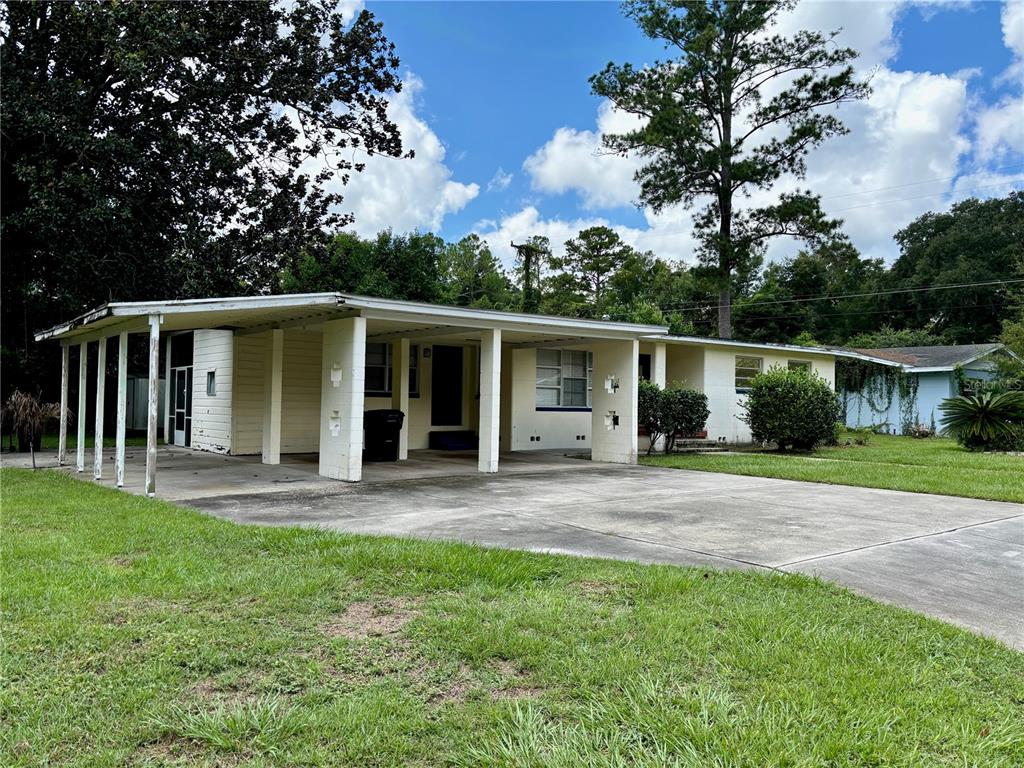 front view of a house with a yard