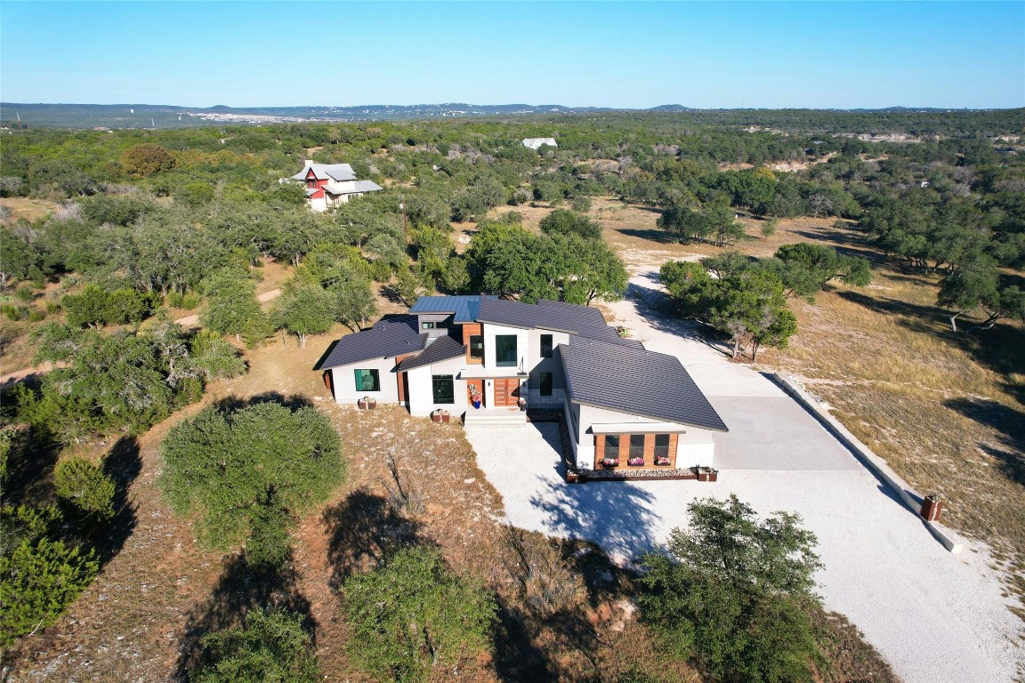 This high quality custom home sits on 8 acres with low tax rates!