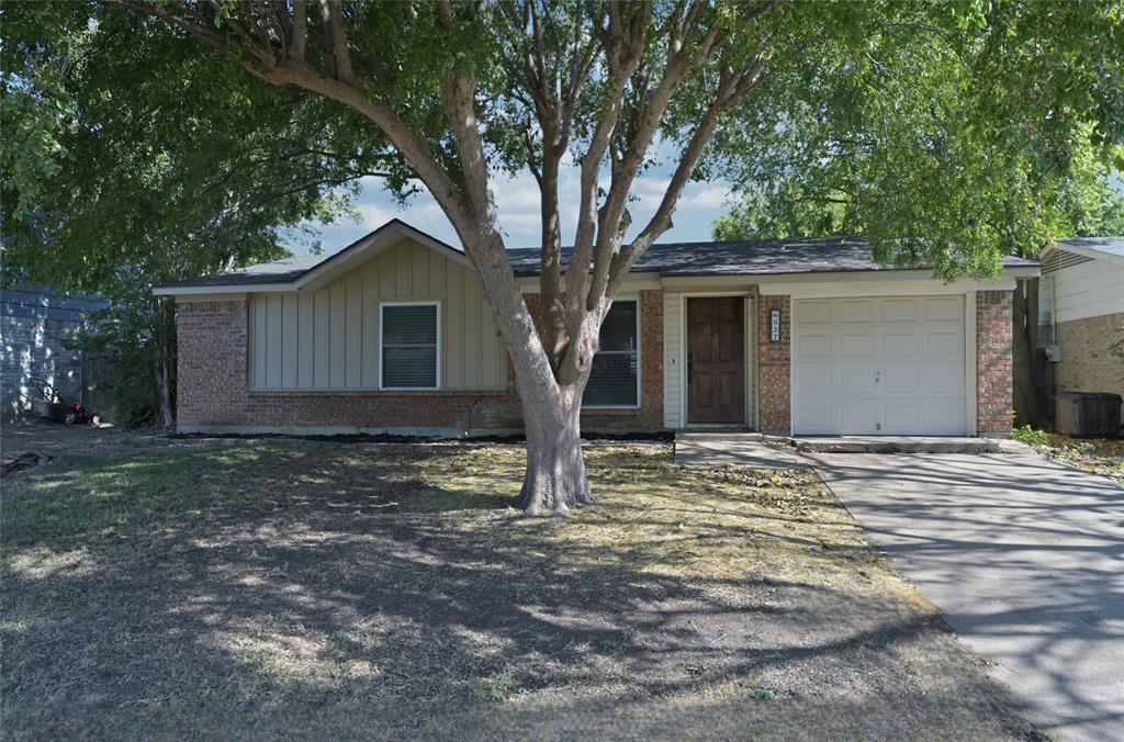 a house with trees in front of it