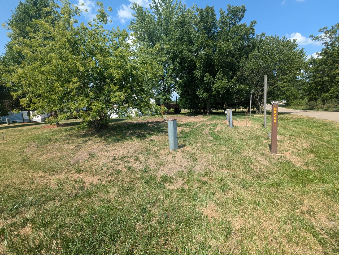 a fire hydrant in the middle of a field