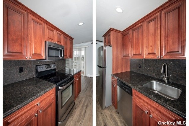 a kitchen with granite countertop a sink stove and refrigerator