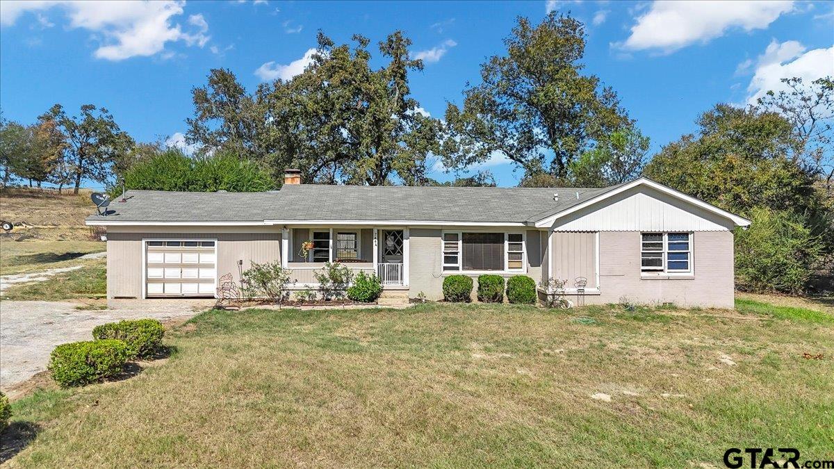 front view of a house with yard