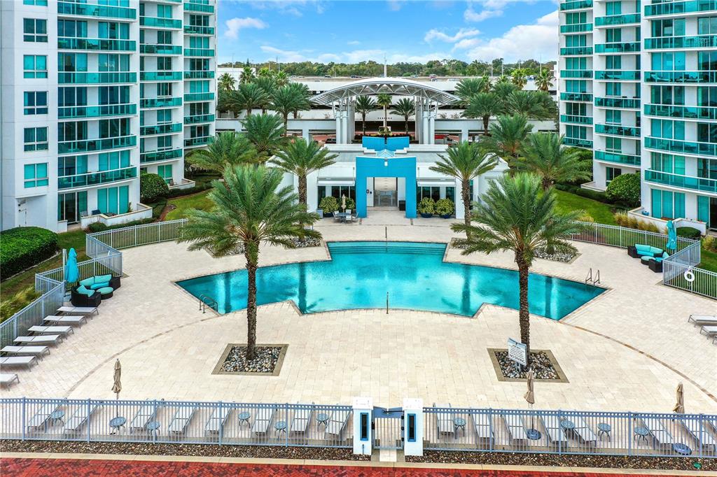 a view of a swimming pool with a patio