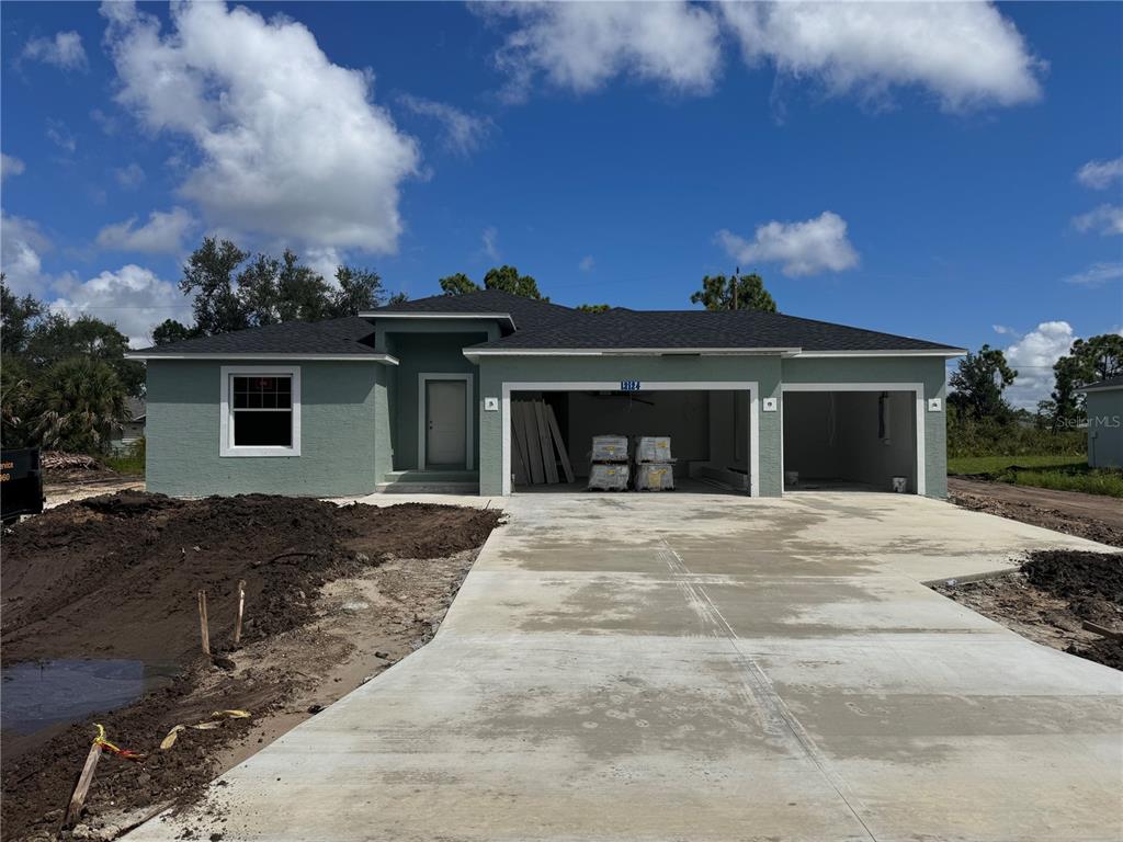 front view of a house with a yard