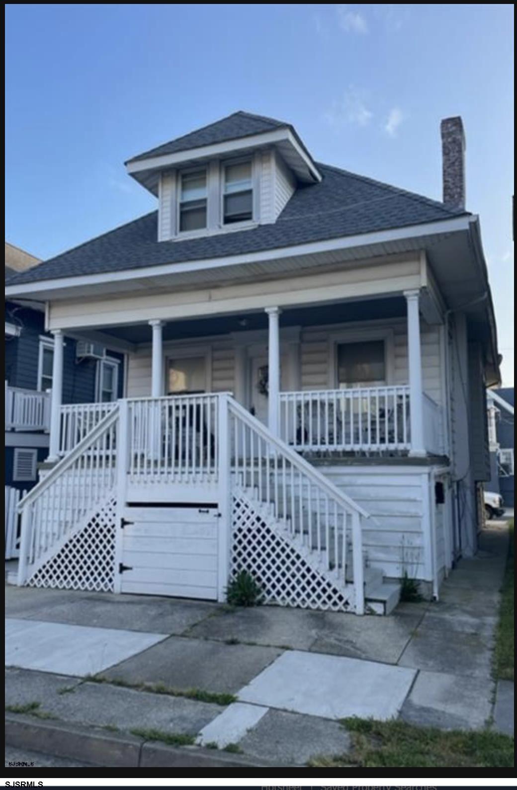 a view of house with deck