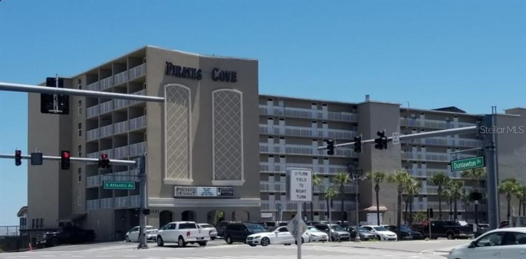 a front view of a building with street view