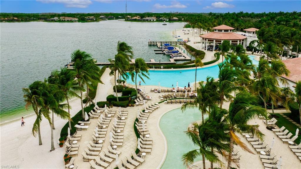 Birds eye view of property featuring a water view