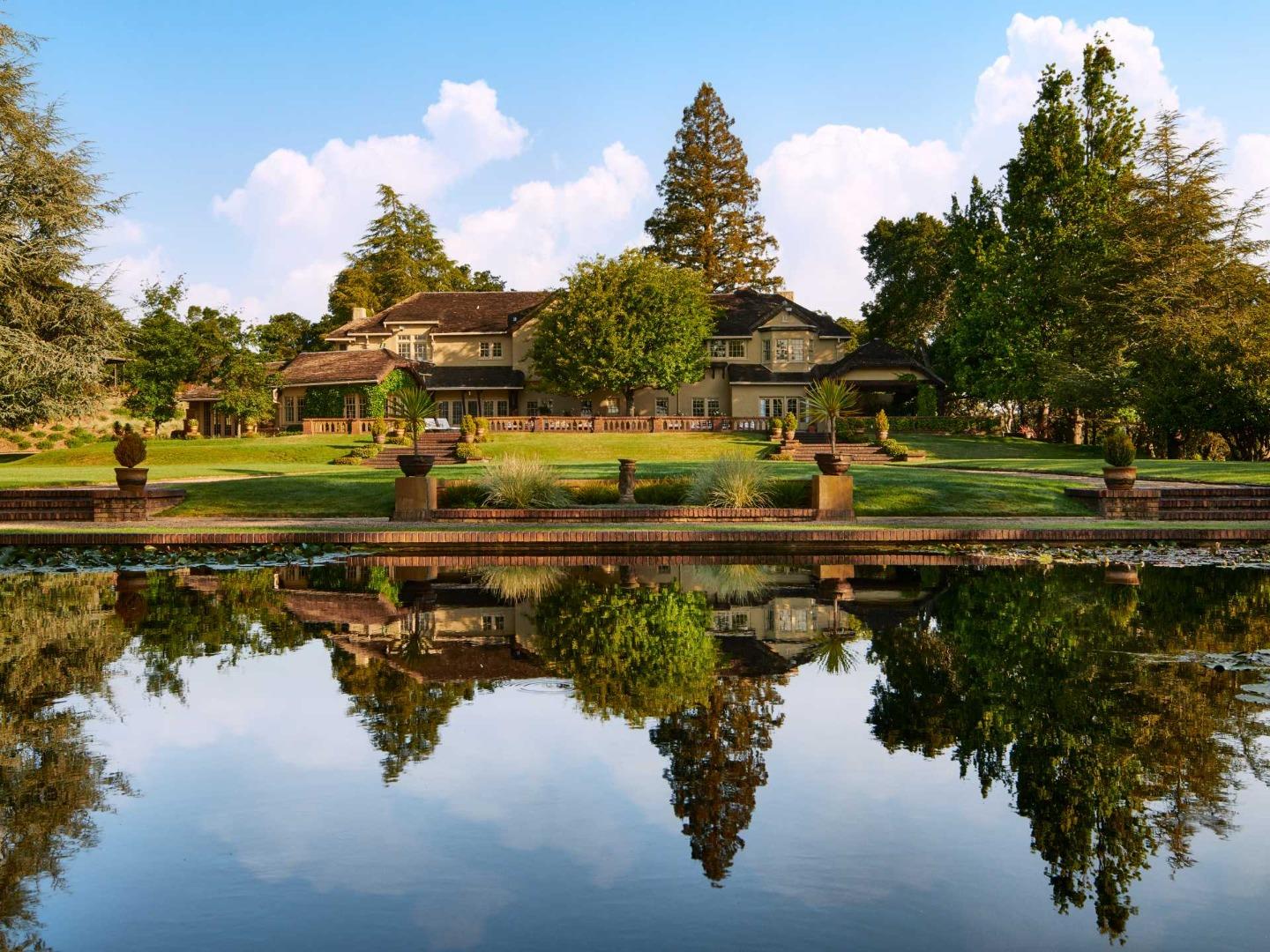 a view of a lake with a house