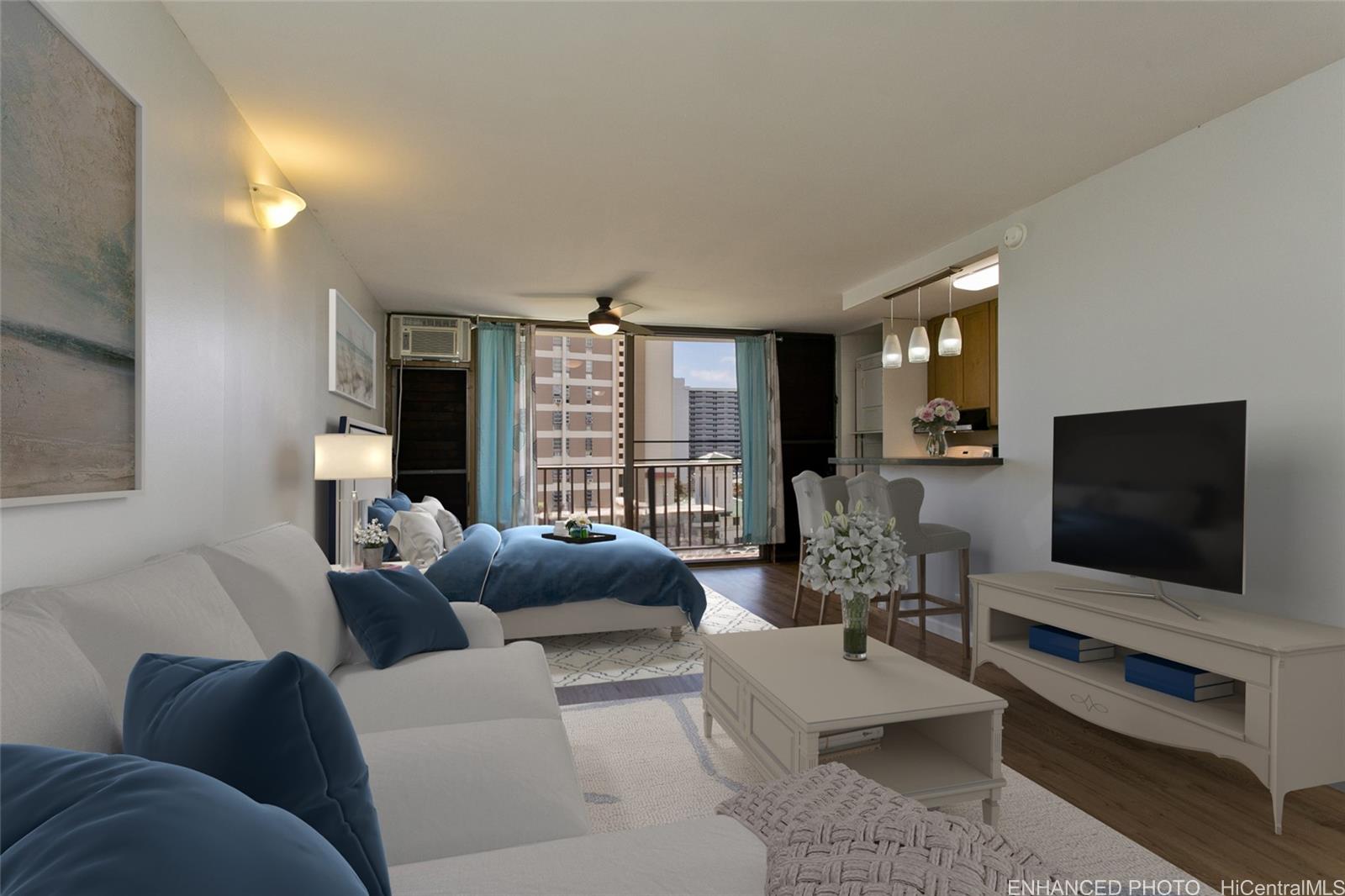 a living room with furniture and a flat screen tv