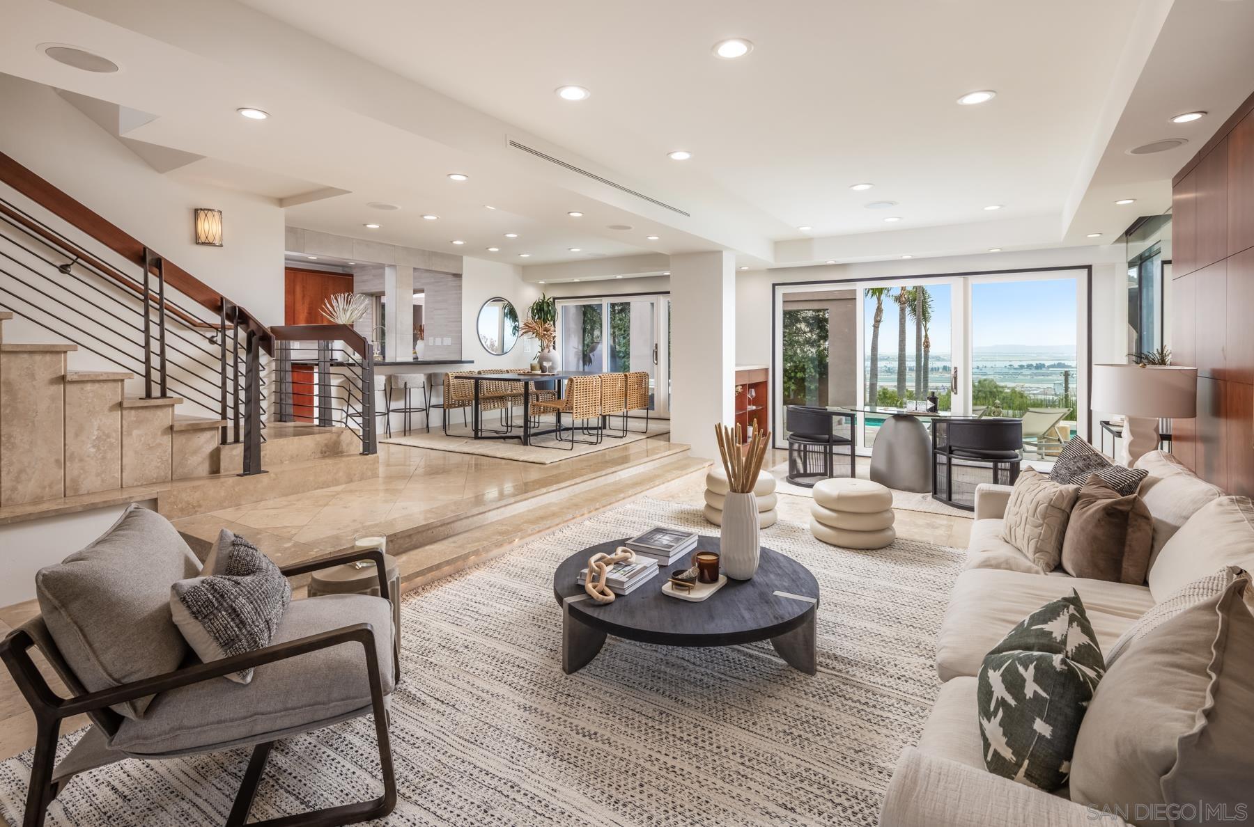 a living room with furniture and a table