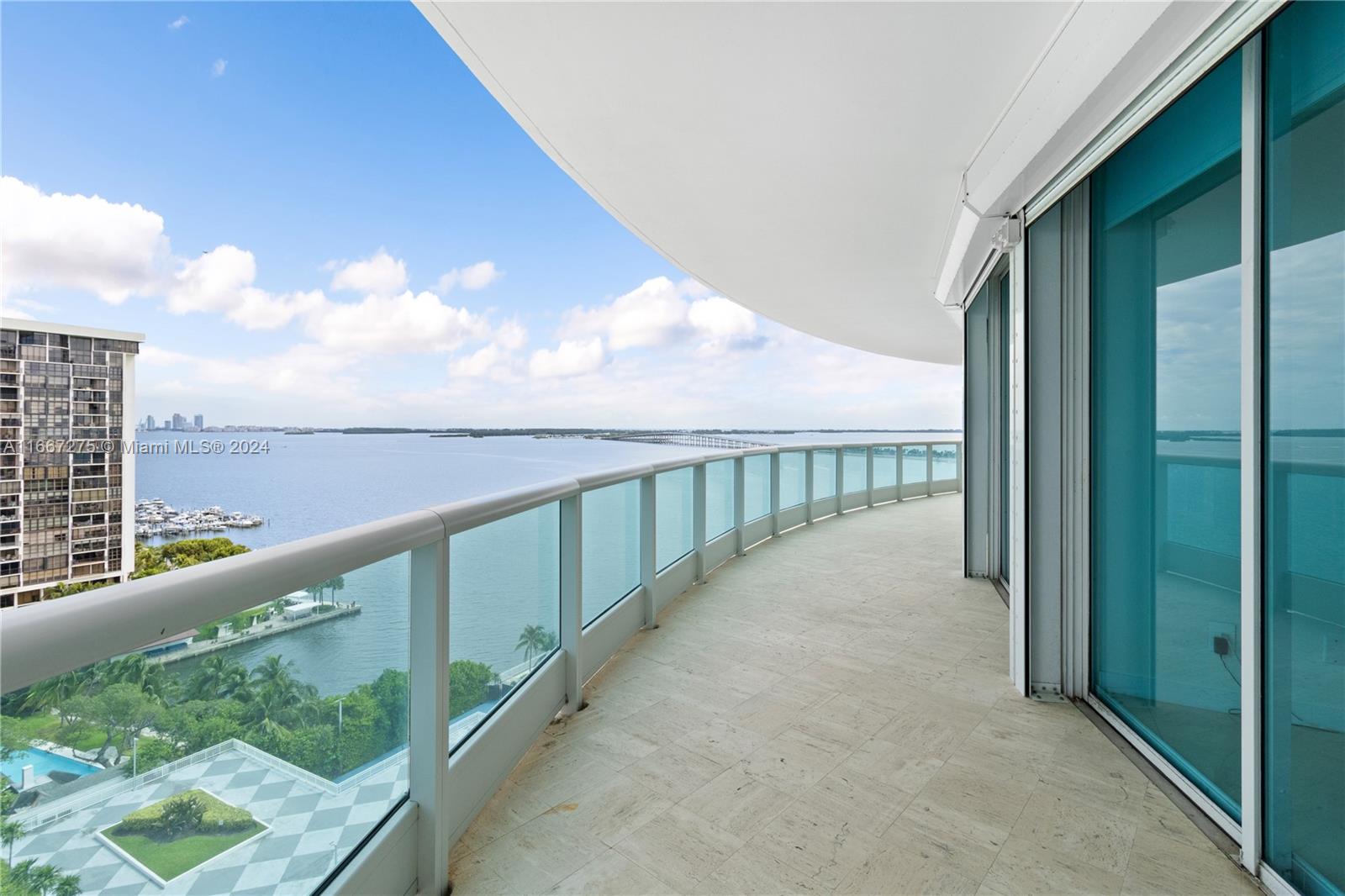 a view of a balcony with an ocean view