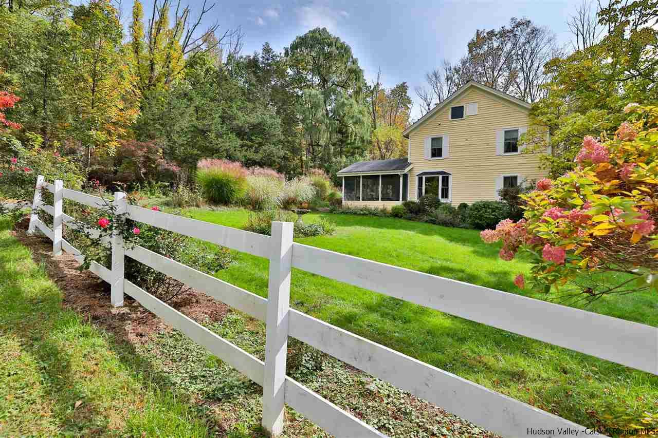 a view of house with outdoor space