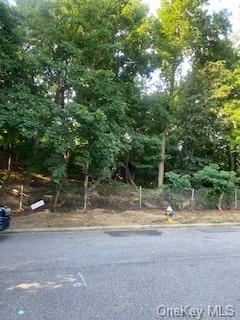 a view of road with trees