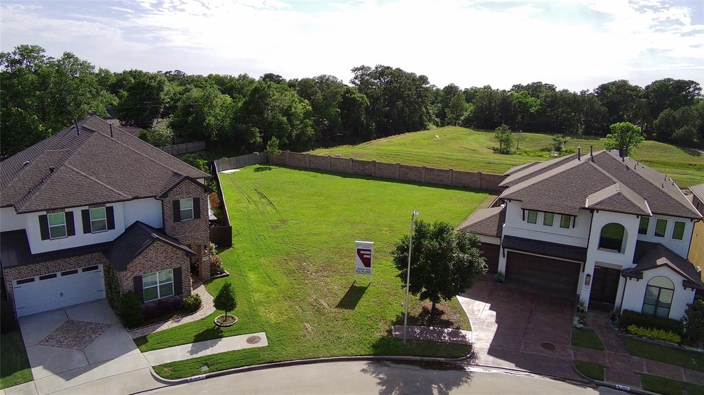 a aerial view of a house with a garden