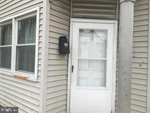 a view of front door and deck